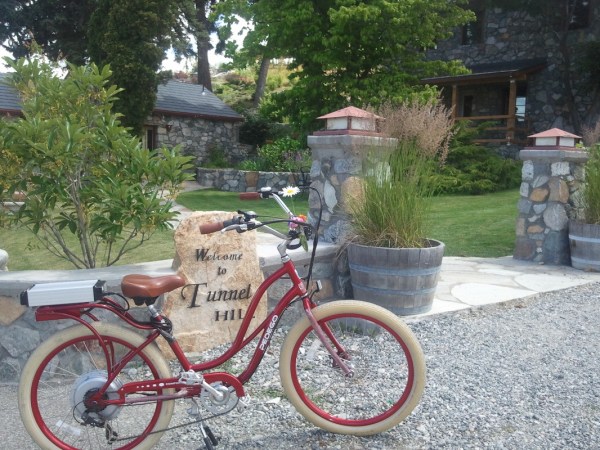 a bicycle parked on the side of a building