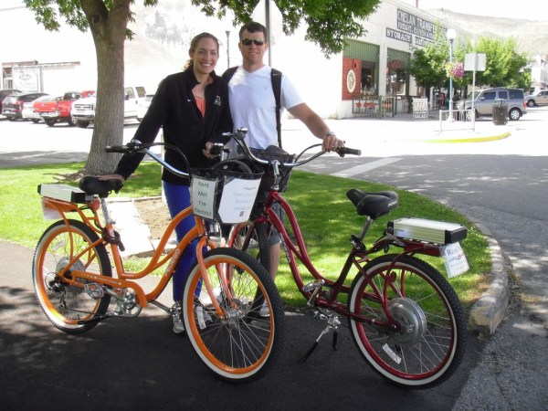 a man riding on the back of a bicycle